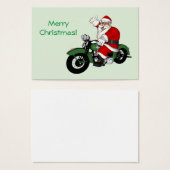 Der Weihnachtsmann auf dem grünen Vintagen Motorra (Vorne & Hinten)