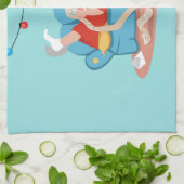 Der Weihnachtsmann auf dem Sofa im Schlafanzug Geschirrtuch (Gefaltet)