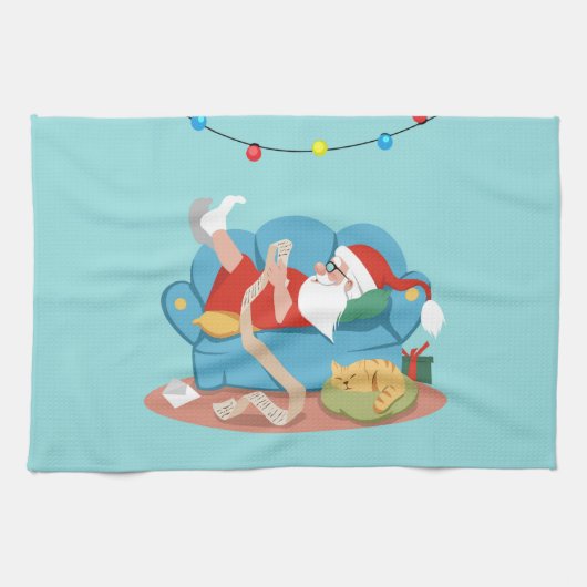 Der Weihnachtsmann auf dem Sofa im Schlafanzug Geschirrtuch (Horizontal)