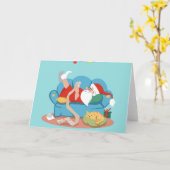 Der Weihnachtsmann auf dem Sofa im Schlafanzug Karte (Gelbe Blume)