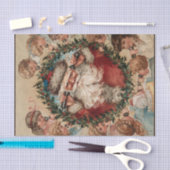 Der Weihnachtsmann auf den Handys, umgeben von Kin Seidenpapier (Handwerk)