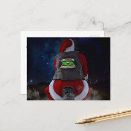 Der Weihnachtsmann auf einem Motorrad Feiertagspostkarte