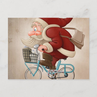 Der Weihnachtsmann fährt mit dem Fahrrad Feiertagspostkarte