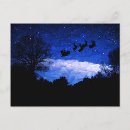 Der Weihnachtsmann fliegt durch ein Weihnachtslich Postkarte
