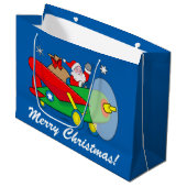 Der Weihnachtsmann fliegt ein Flugzeug voller Gesc Große Geschenktüte (Vorderseite Schrägansicht)