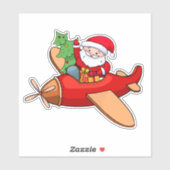 Der Weihnachtsmann fliegt mit Geschenken in einem Aufkleber (Blatt)