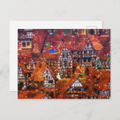 Der Weihnachtsmann fliegt über ein Lebkuchendorf Postkarte (Vorne/Hinten)