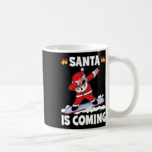 Der Weihnachtsmann kommt mit einem Snowboarden Wei Kaffeetasse