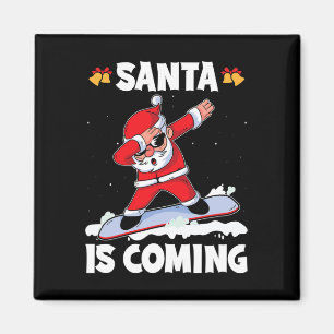 Der Weihnachtsmann kommt mit einem Snowboarden Wei Magnet