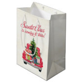 Der Weihnachtsmann kommt nach Town Red Truck Mittlere Geschenktüte (Vorderseite Schrägansicht)