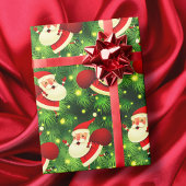 Der Weihnachtsmann kommt niedlich in Rot und Grün Geschenkpapier