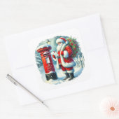 Der Weihnachtsmann liefert Buchstaben in einer sch Quadratischer Aufkleber (Umschlag)