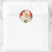 Der Weihnachtsmann mit dem Augenzwinkern Runder Aufkleber (Tasche)