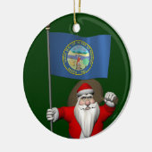 Der Weihnachtsmann mit der Flagge Nebraskas Keramik Ornament (Links)