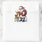 Der Weihnachtsmann mit einem freundlichen Hirschen Quadratischer Aufkleber (Tasche)