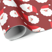 Der Weihnachtsmann mit Red Hat und White Beard nah Geschenkpapier (Rolleneckpunkt)
