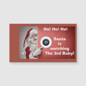 Der Weihnachtsmann sieht sich den dritten Babymagn Magnetkarte (Vorderseite)