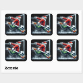 Der Weihnachtsmann startet einen Fußballball im Wi Quadratischer Aufkleber (Blatt)