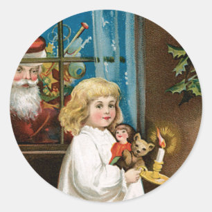 Der Weihnachtsmann steht am Fenster Runder Aufkleber