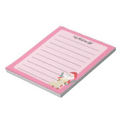 Der Weihnachtsmann überprüft seine Liste mit rosa  Notizblock (Rotiert)