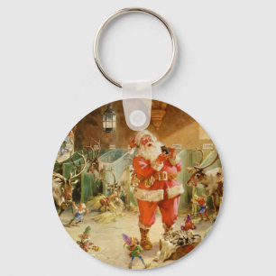 Der Weihnachtsmann und seine Elfen im Rentiergesta Schlüsselanhänger