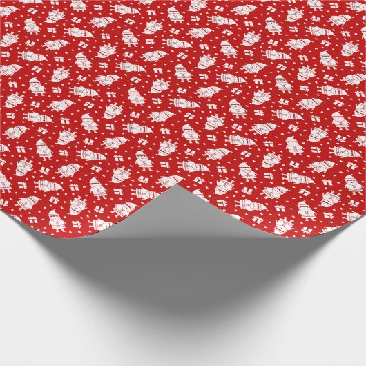 Der weiße Weihnachtsmann über den roten Hintergrun Geschenkpapier (Ecke)