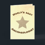 Der weltbeste Archäologe Golden Star Karte<br><div class="desc">This simple greeting card has the words "World's best archaeologist" in fancy bold'primitive characters and a big gold star on "dirty" yellow and orange background. The same colorful sand-like background is repeated inside the card, which is left empty so you can add your personal text or just have it signed...</div>