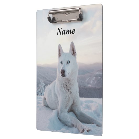 Der zauberhafte Weiße Husky-Hund im Schnee Klemmbrett (Links)