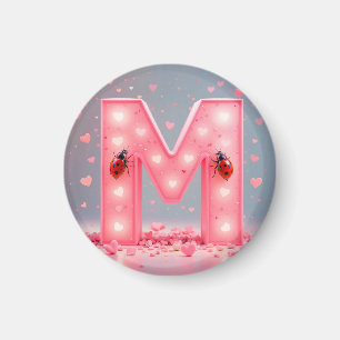 Design des hellrosa Buchstaben M Magnet