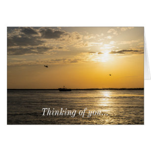 Destin-Sonnenuntergang und Hubschrauber - Denk-an-