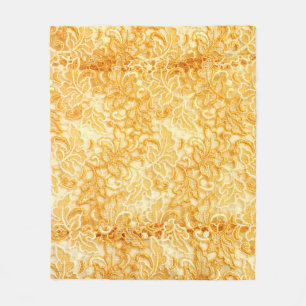 Detail aus Stoff mit goldenem Spitzen Fleecedecke