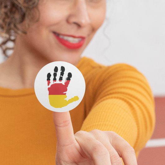 Deutsche Flagge auf der Hand Aufkleber