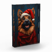 Deutscher Hirte in einer Weihnachtsmannmütze Fotoblock (Links)