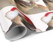 Deutscher Schäferhund mit einem Weihnachtshut Geschenkpapier (Rolleneckpunkt)