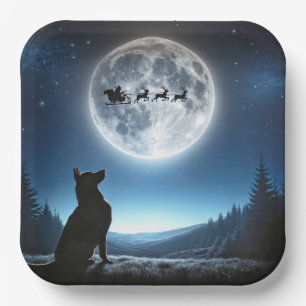 Deutscher Schäferhund sieht Weihnachtsmann und Ren Pappteller