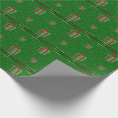 Deutsches Weihnachtsgeschenk verpackt grünes Geschenkpapier (Ecke)