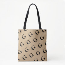 Diagonal Schwarzes Monogramm Muster auf Tan Hinter