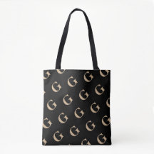 Diagonal Tan Monogram Muster auf schwarzem Hinterg