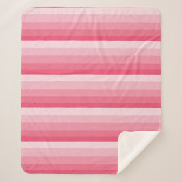 Diagonale Ombre-Streifen in rosa Tönen Sherpadecke