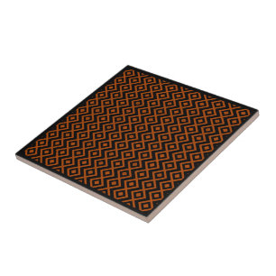 Diamantförmiges Harlekin-Muster Schwarz und Orange Fliese