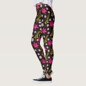 Dicke Blumenmuster auf schwarzem Hintergrund Leggings (Links)