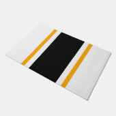 Dicke schwarz-gelbe vertikale Streifen auf Weiß Fußmatte (Schrägansicht)