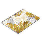 Dicken aus einer Monstera-Pflanze. Bild des Golden Notizblock (Linke Seite)