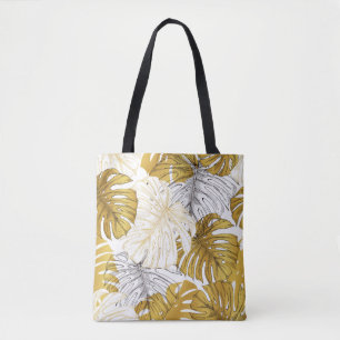 Dicken aus einer Monstera-Pflanze. Bild des Golden Tasche