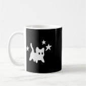 Die 90er Jahre Beängstigende Tomcat-Katze wird unt Kaffeetasse (Links)