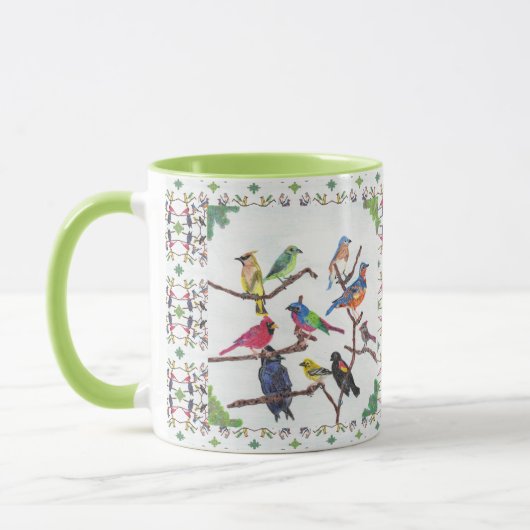 Die Ansammlungs-bunte Singvogel-gemusterte Tasse (Links)