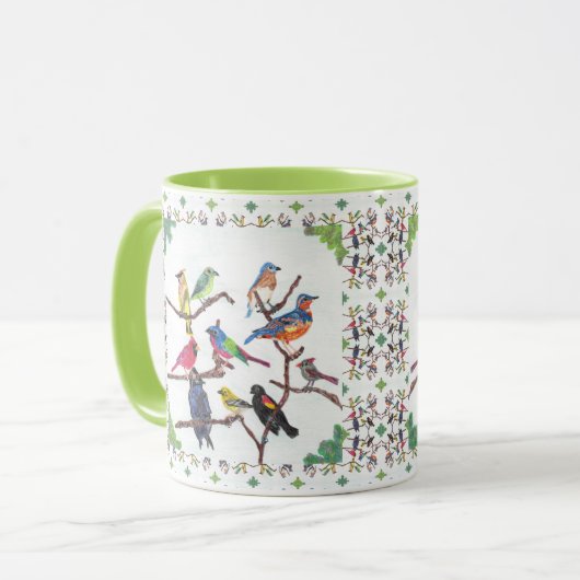 Die Ansammlungs-bunte Singvogel-gemusterte Tasse (Vorderseite Links)