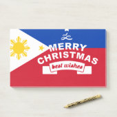 Die besten Wünsche für frohe Weihnachten und ein g Post-it Klebezettel (Auf Schreibtisch)