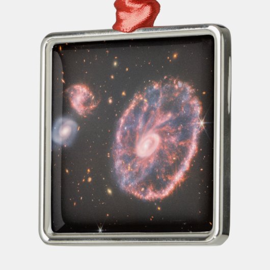 Die Cartwheel Galaxie und ihre Begleitgalaxien. Ornament Aus Metall (Links)