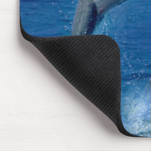 Die Delphine springend für Freude auf einer Mousepad (Ecke)